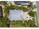 Aerial shot of roof and surrounding landscape offering lush greenery around the property at 401 N Bay Blvd, Anna Maria, FL 34216