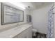 Bathroom featuring a framed mirror, and a combined shower and tub at 401 N Bay Blvd, Anna Maria, FL 34216