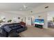Open living room showcasing comfortable seating and a view of the modern kitchen at 401 N Bay Blvd, Anna Maria, FL 34216
