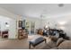 Bright living room with access to outdoor balcony at 401 N Bay Blvd, Anna Maria, FL 34216