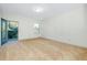 Empty bedroom with carpet flooring and door to balcony at 4532 Chinkapin Dr, Sarasota, FL 34232