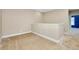 Empty bedroom with carpet flooring and wainscoting at 4532 Chinkapin Dr, Sarasota, FL 34232