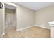Empty bedroom with carpet flooring and view of the hallway at 4532 Chinkapin Dr, Sarasota, FL 34232