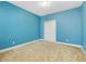Bright and spacious bedroom with carpet, a simple closet, and a clean, open space at 4532 Chinkapin Dr, Sarasota, FL 34232