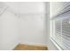 White walk-in closet featuring carpet and wire shelving at 4532 Chinkapin Dr, Sarasota, FL 34232
