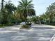 Gated community entrance with lush landscaping at 4532 Chinkapin Dr, Sarasota, FL 34232