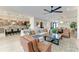 Spacious open floor plan showcasing the living room, dining area, and kitchen with ample seating at 4915 Kiva Cir, Bradenton, FL 34211