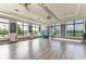 Bright yoga studio with wood floors, large windows, and fitness equipment at 4915 Kiva Cir, Bradenton, FL 34211