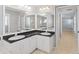 Bathroom featuring double sinks, a granite countertop, and a bright color scheme at 5206 19Th W Ave, Bradenton, FL 34209