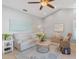 Bright living room featuring tile floors, vaulted ceiling, and comfortable seating at 5206 19Th W Ave, Bradenton, FL 34209