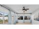 Bright sunroom with lots of windows, tile flooring, a ceiling fan, and neutral paint at 5206 19Th W Ave, Bradenton, FL 34209