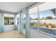Sunroom featuring tile flooring, lots of windows, and neutral paint at 5206 19Th W Ave, Bradenton, FL 34209