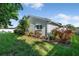 Charming home with manicured lawn, mature plantings, and a well maintained exterior at 5206 19Th W Ave, Bradenton, FL 34209