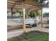 Carport used for boat parking and storage with gravel base at 5702 Tangerine S Ave, Gulfport, FL 33707