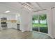 Modern kitchen with stainless steel appliances and backyard views at 5702 Tangerine S Ave, Gulfport, FL 33707