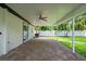 Large covered patio featuring brick pavers, perfect for outdoor living and relaxation at 5702 Tangerine S Ave, Gulfport, FL 33707
