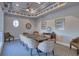 Well-appointed conference room featuring a large table, comfortable chairs, and elegant decor at 6312 41St E Ct, Sarasota, FL 34243