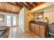 The wet bar is conveniently located in the living room with views of the outside patio at 6806 Palm Dr, Holmes Beach, FL 34217