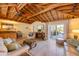 Spacious living room with high ceilings and wet bar gives an airy feel, perfect for relaxation and entertainment at 6806 Palm Dr, Holmes Beach, FL 34217
