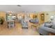 Open-concept living and dining area with comfortable seating and bright, natural light at 6806 Palm Dr, Holmes Beach, FL 34217