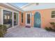 Charming patio includes an outdoor shower adorned with colorful mosaic tiles at 6806 Palm Dr, Holmes Beach, FL 34217
