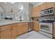Kitchen showcasing stainless steel appliances and ample counter space at 695 Rivendell Blvd, Osprey, FL 34229