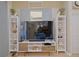 Bright living room with entertainment center and a view into other parts of the home at 695 Rivendell Blvd, Osprey, FL 34229