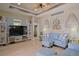 Cozy living room featuring light blue seating and a ceiling fan at 695 Rivendell Blvd, Osprey, FL 34229