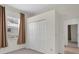 Cozy bedroom featuring a closet and large windows with curtains at 7026 43Rd E Ave, Palmetto, FL 34221