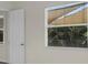 Bright room with view through window and adjacent door at 7026 43Rd E Ave, Palmetto, FL 34221