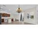 Open dining space next to the kitchen with stainless appliances and access to outdoor living at 7026 43Rd E Ave, Palmetto, FL 34221