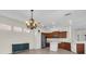 Dining area adjacent to the kitchen, featuring stainless steel appliances and ample natural lighting at 7026 43Rd E Ave, Palmetto, FL 34221