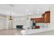Inviting kitchen space, showcasing updated cabinets, stainless steel appliances, and adjacent dining area at 7026 43Rd E Ave, Palmetto, FL 34221