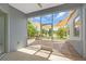 Relaxing covered patio with screened enclosure offering serene water views at 7026 43Rd E Ave, Palmetto, FL 34221