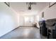 Spacious garage with ample room for parking and storage, features laundry hookups at 7164 Gama Ct, North Port, FL 34287