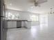 Gourmet kitchen with stainless steel appliances, granite countertops, and a large breakfast bar island at 7164 Gama Ct, North Port, FL 34287