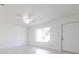 Bright and airy living space with a modern ceiling fan, freshly painted walls, and lots of natural light at 7164 Gama Ct, North Port, FL 34287