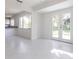 An additional room with a window and doors leading to the outside at 7164 Gama Ct, North Port, FL 34287