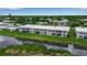 Charming condominiums overlooking the lush green golf course, tranquil waterway, and beautifully landscaped grounds at 7301 W. Country Club N Dr # 108, Sarasota, FL 34243
