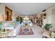 Spacious living room featuring stylish seating, tasteful decor, and bright natural light at 7301 W. Country Club N Dr # 108, Sarasota, FL 34243