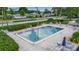 Take a dip in the community pool, surrounded by palm trees and offering a relaxing atmosphere for residents at 7301 W. Country Club N Dr # 108, Sarasota, FL 34243