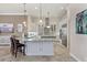 Gourmet kitchen featuring granite countertops, stainless steel appliances, and custom cabinetry at 7605 Haddington Cv, Lakewood Ranch, FL 34202