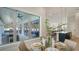 Dining area showcasing views of the outdoor kitchen and pool area at 8009 20Th W Pl, Bradenton, FL 34209