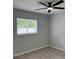 Bedroom featuring a window letting in natural light at 811 24Th Street E Ct, Bradenton, FL 34208