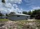 Exterior view of home with cloudy sky and landscaping at 811 24Th Street E Ct, Bradenton, FL 34208