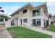 Inviting two-story condo with a charming balcony and well-maintained lawn at 999 Inlet Cir # 103, Venice, FL 34285