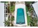 Aerial view of the pool and lounge chairs at 999 Inlet Cir # 103, Venice, FL 34285