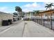 Community shuffleboard courts next to the pool and condo building at 999 Inlet Cir # 103, Venice, FL 34285