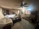 Living room featuring a comfortable L shaped couch and plenty of space to gather at 11234 Areca Dr, Port Richey, FL 34668