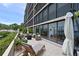 Stunning balcony with water views, outdoor seating and an open patio area at 1510 1St W Ave # 102, Bradenton, FL 34205
